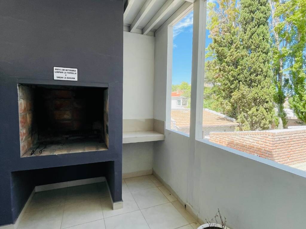 Barbecue grill with a window onto the trees